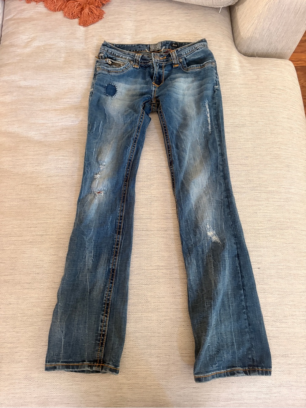 Women's Flare Distressed Jeans in Blue